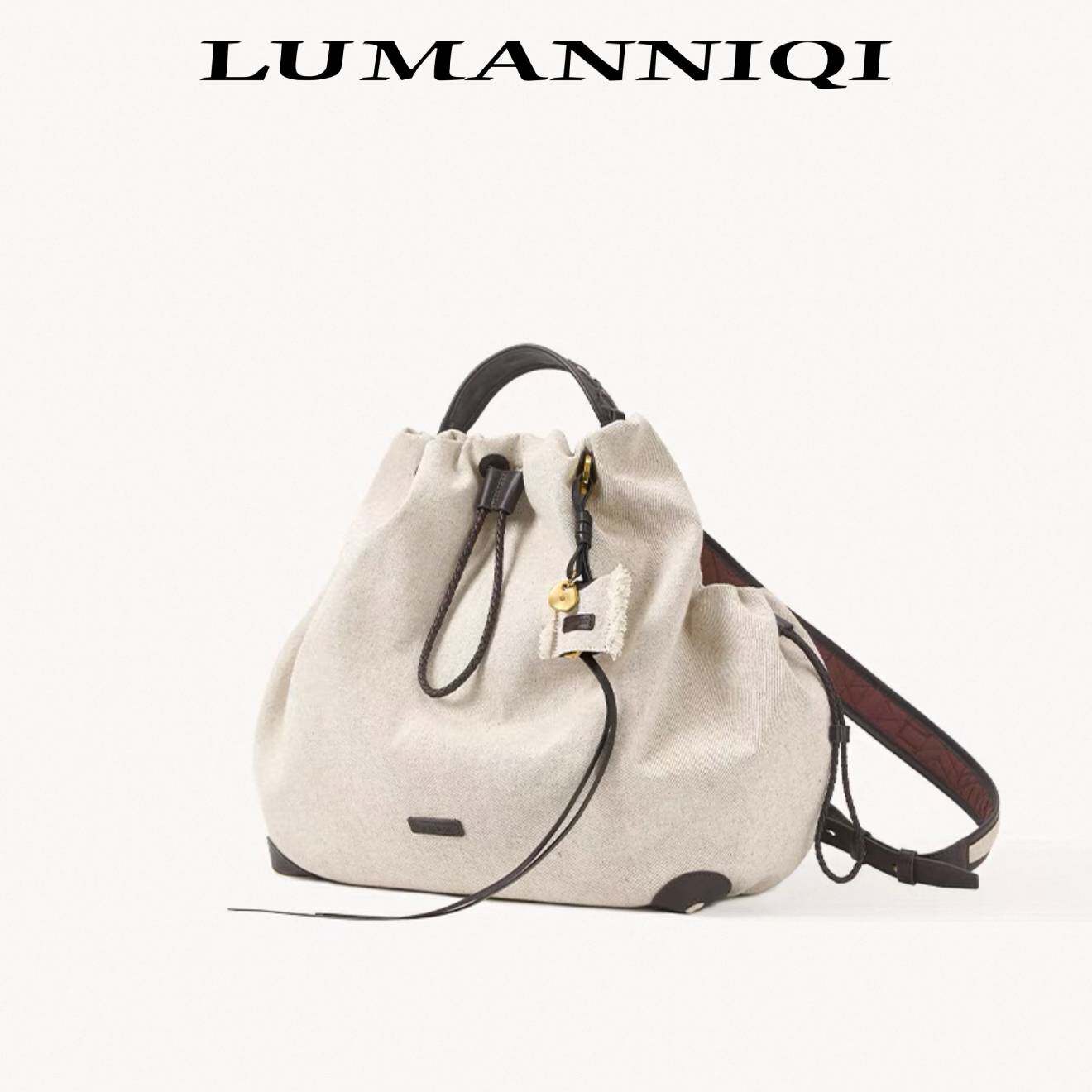 露嫚妮琦文淇同款真皮帆布双肩包大容量男女通用旅游健身登山包包