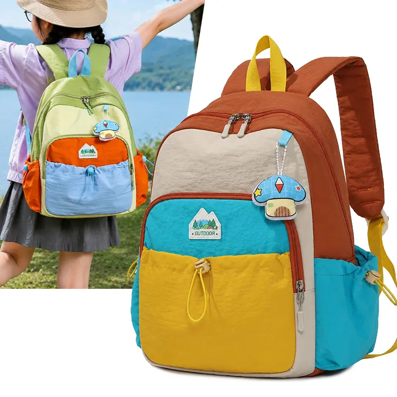 儿童防水拼色双肩包幼儿园小学生