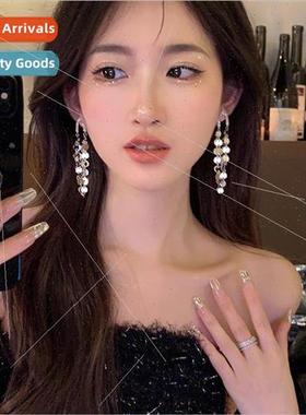 New earrings female niche premium silver circle sequins tass