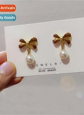 Autumn winter oil drip bow pearl earrings female 2023 new Me