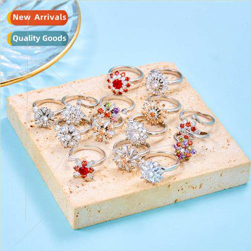 Fashion rotating ring Korea rotating flowers wh diamonds ope