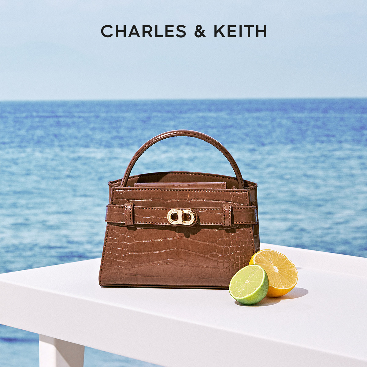Charles & Keith timsah naxışlı qadın çantası, krossbody model