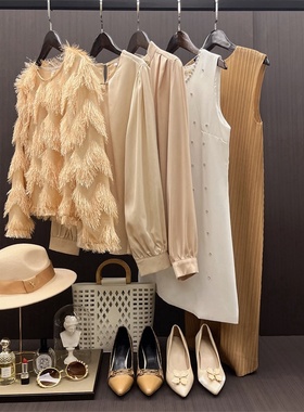 现代样板房衣服衣帽间装饰品摆件样板间女装驼色服饰软装