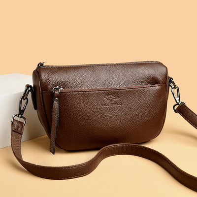 真皮质感小包包女士2025新款时尚单肩斜挎包时尚百搭宽肩带饺子包