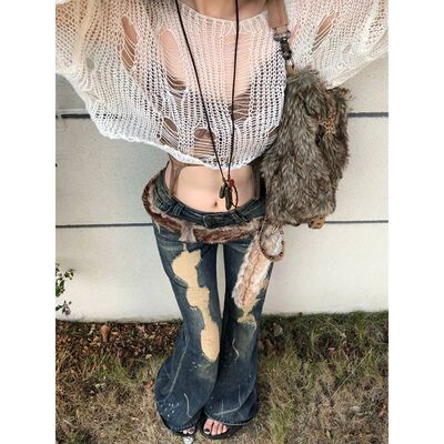 低腰破洞修身微喇女裤