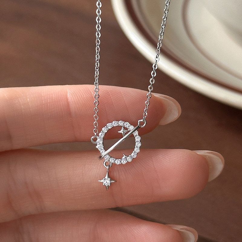 S999纯银镂空锆石星球项链女时尚个性高级感星辰四芒星流苏锁骨链