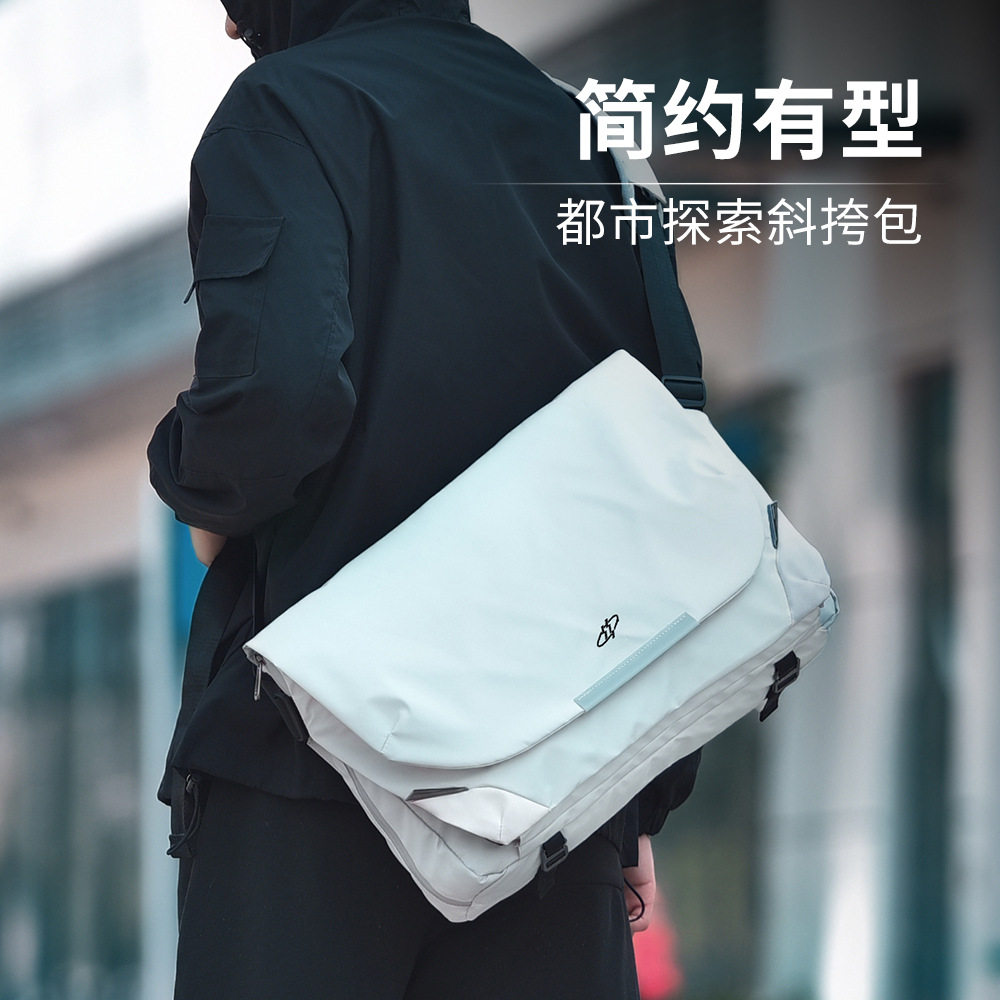 斜肩包男新款休闲磁吸扣单肩包