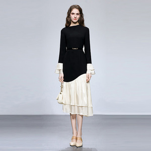 2026春季新款时尚优雅不规则荷叶边设计收腰修身黑色中长连衣裙