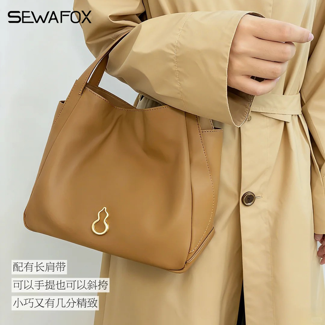 单肩斜挎包女包简约小月牙通勤包