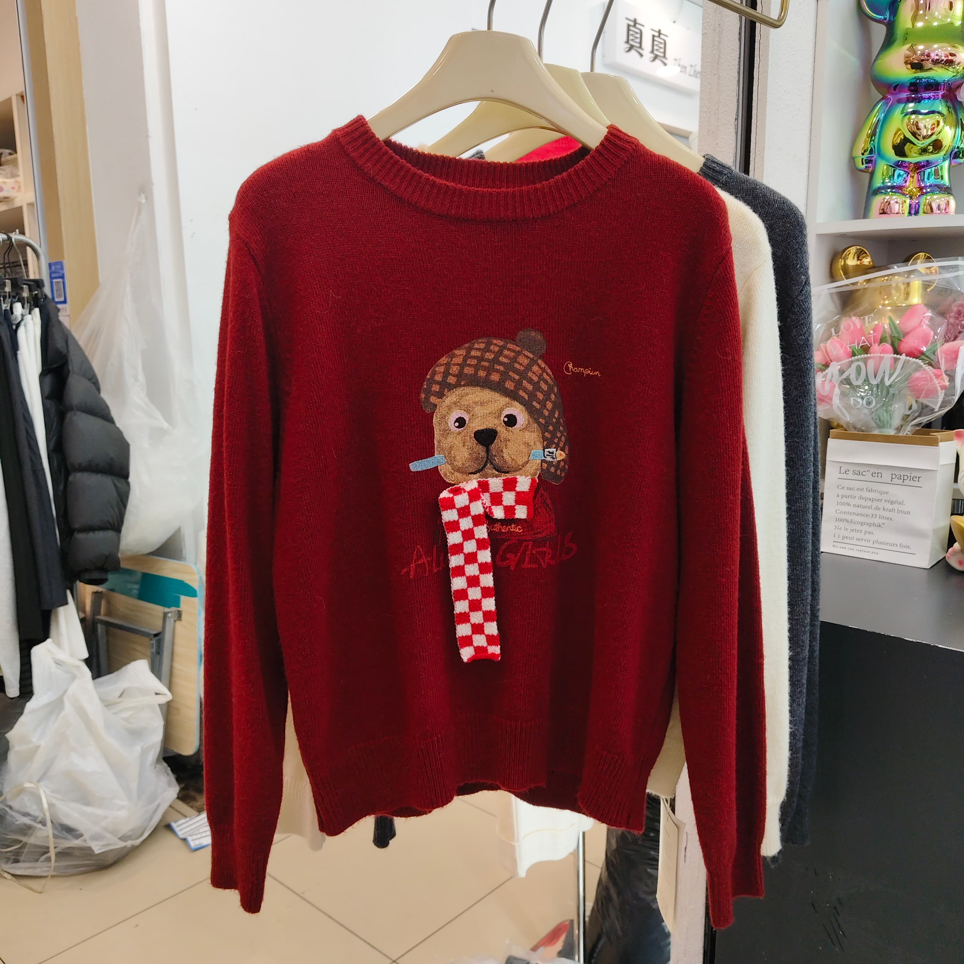 印花圆领浣熊绒长袖针织衫女