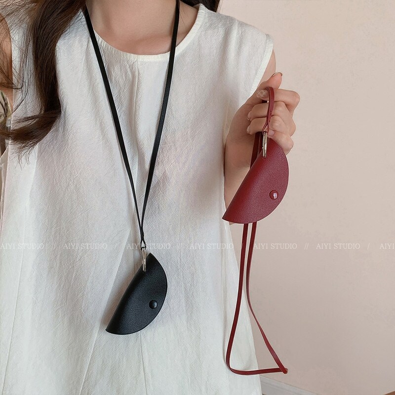 韩国皮质饺子包项链眼镜挂链磁吸长款毛衣链轻奢高级感脖子配饰女