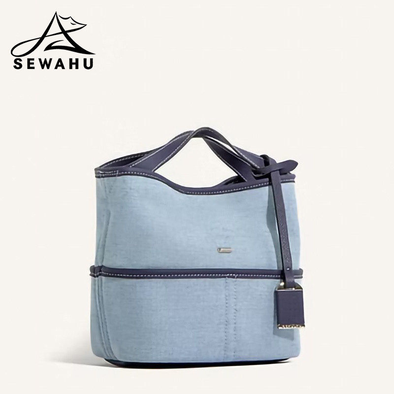 设计感小众斜挎包女2025新款菜篮子水桶手提包单肩包通勤上班包包