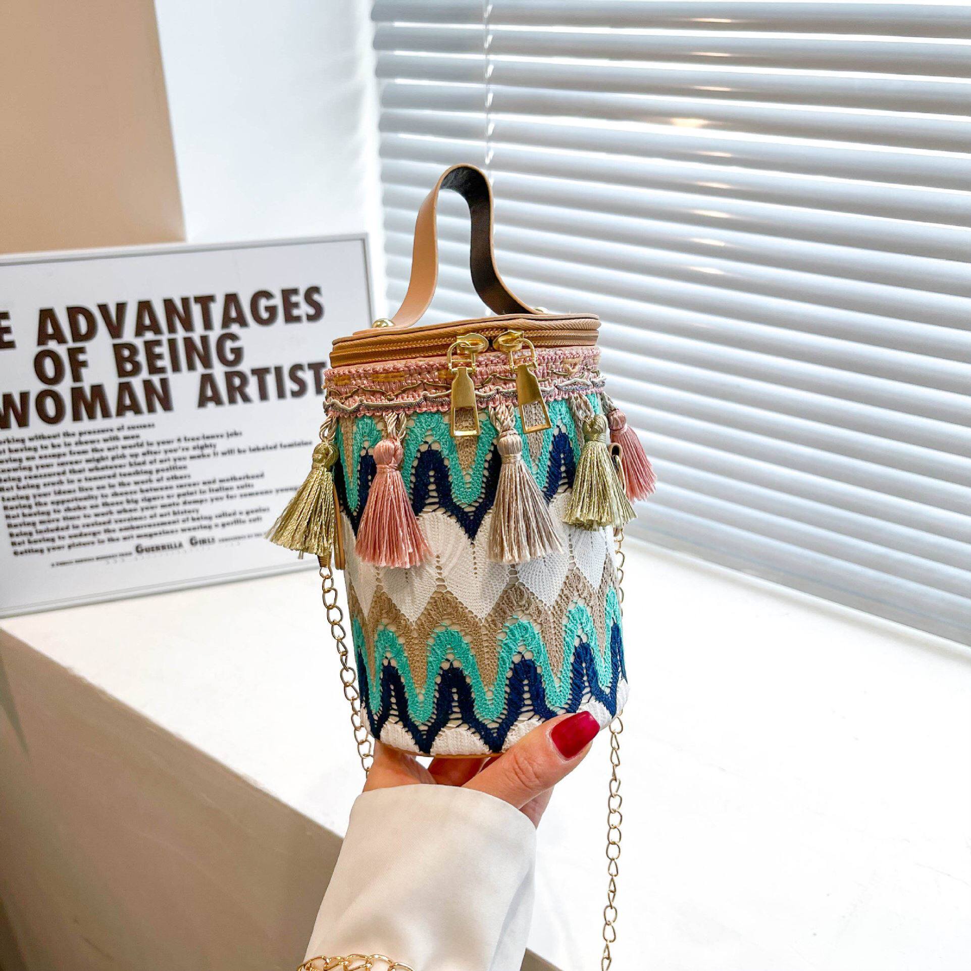 新疆民族风包包小众设计单肩斜挎圆筒包复古流苏水桶包云南伴手礼