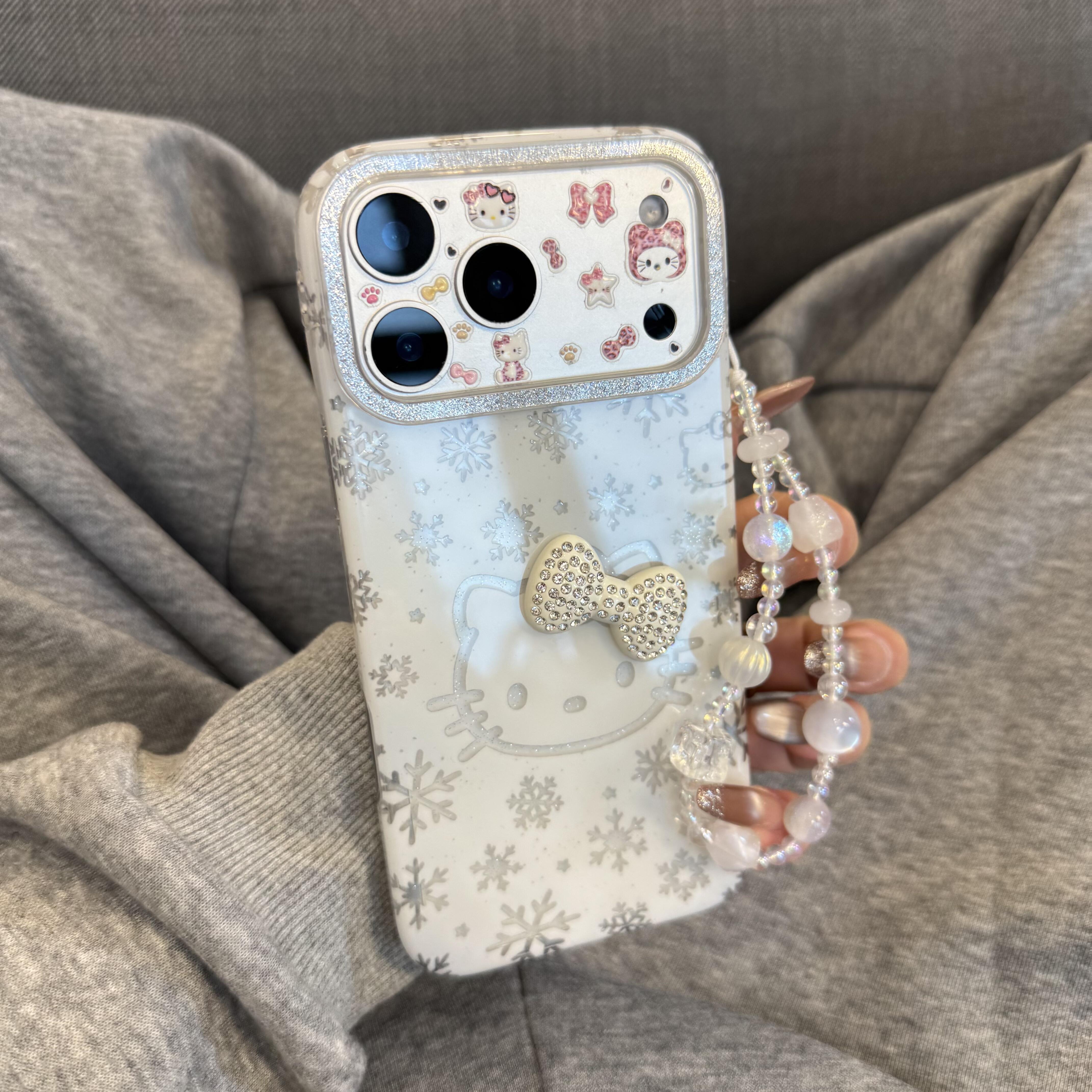 ins冬日雪花KT猫立体蝴蝶结链条手机壳适用苹果17promax新款iPhone17pro大孔全包17保护套16pro防摔15/14小众