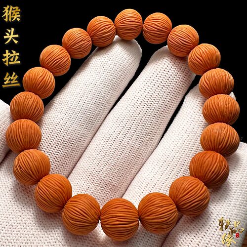 正圆拉丝猴头核桃手串