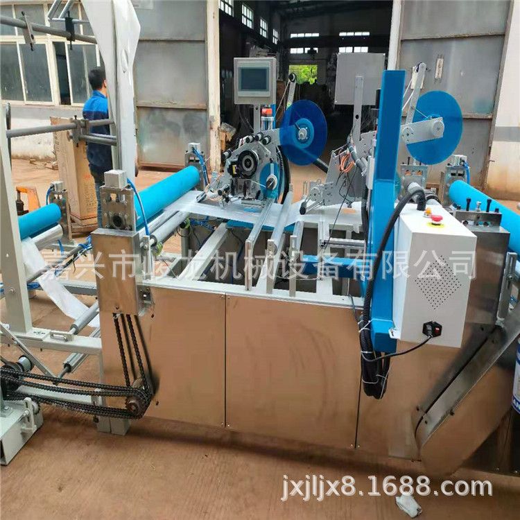 1JL-ZC1000型插刀式床单折叠机设备，一次性手术洞巾孔巾机器