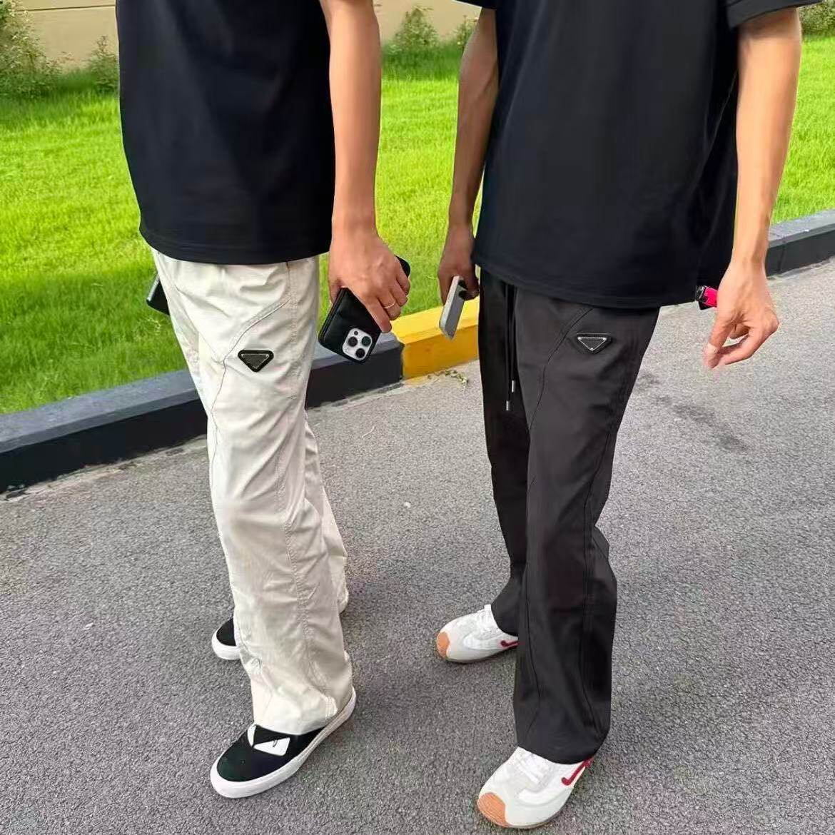 潮牌休闲金属黑三角标直筒微辣裤男女情侣款宽松百搭长裤夏季裤子