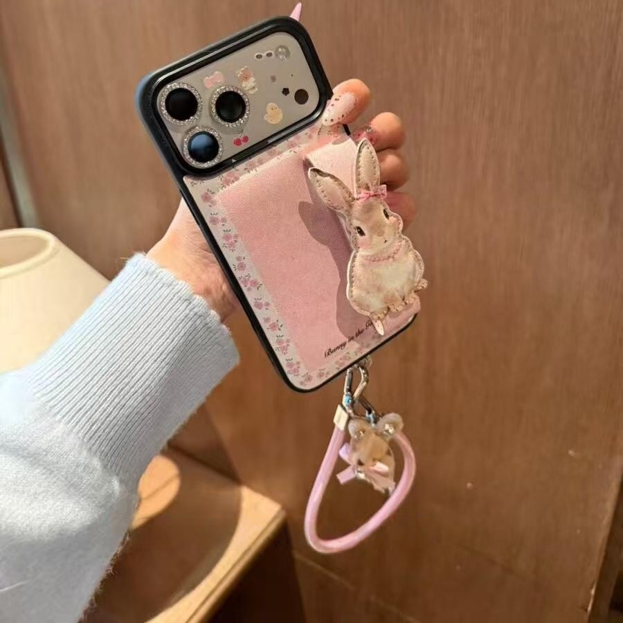 高级感碎花兔子手腕带适用iPhone17promax手机壳15新款17pro网红女款13创意全包防摔16pro超好看17保护套