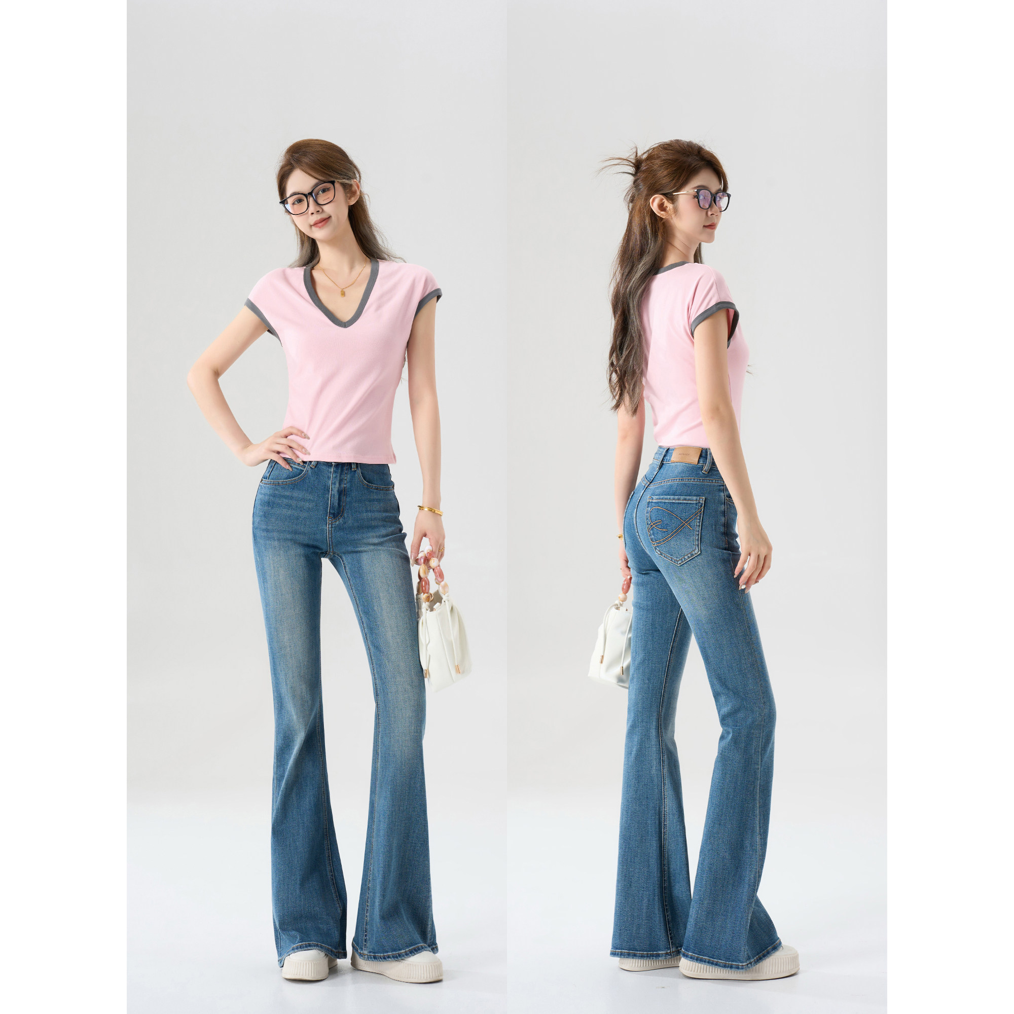 王家有鱼2026春季新款中腰复古蓝刺绣显瘦不贴腿浅色微喇牛仔裤女