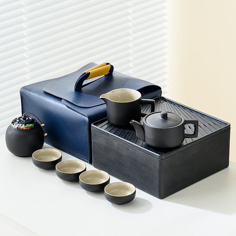 Travel tea set, including one pot and four cups