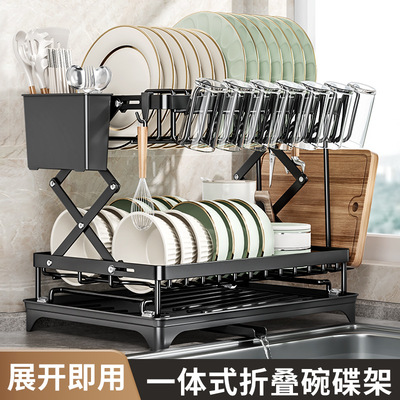 Kitchen folding bowl and dish rack, countertop with multiple layers of bowls, plates, tableware, cups, storage, drainag
