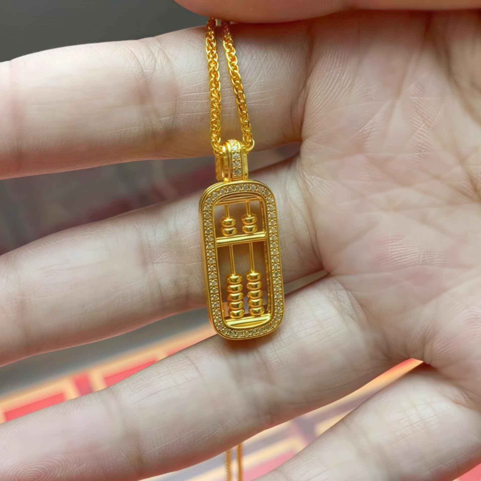 【水贝黄金新中式金包银算盘吊坠可转动点钻算盘项链送女友礼物