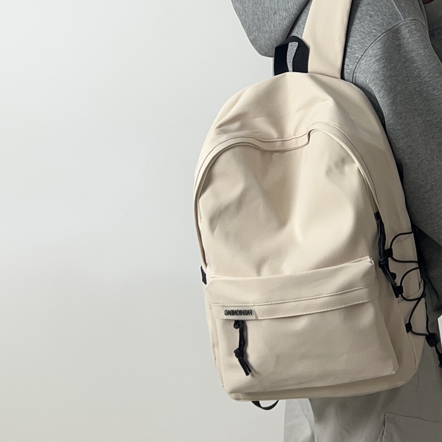 纯色休闲双肩包女百搭旅游高颜值背包男防水初高中大学生通勤书包