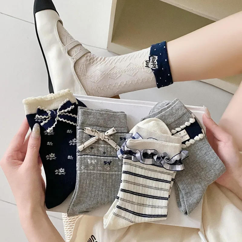韩国袜子女甜美蝴蝶结饰品中筒袜日系碎花ins布标条纹花边堆堆袜