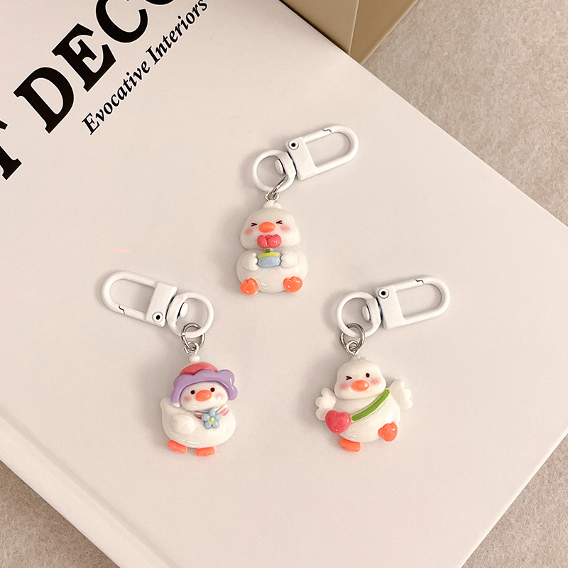 树脂情侣网红手工钥匙扣2024年新款卡套爆款公仔小挂件可爱女玩偶
