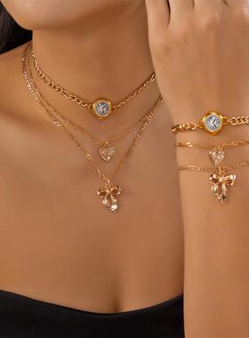 欧美跨境新款蝴蝶结项手饰创意个性表盘爱心吊坠多层叠戴项链套装