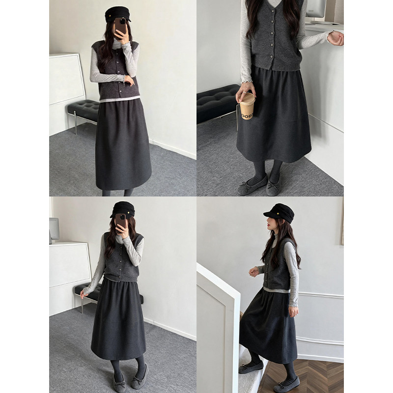 毛呢黑色半身裙短裙女秋冬季2026新款a字伞裙垂坠感五分花苞半裙