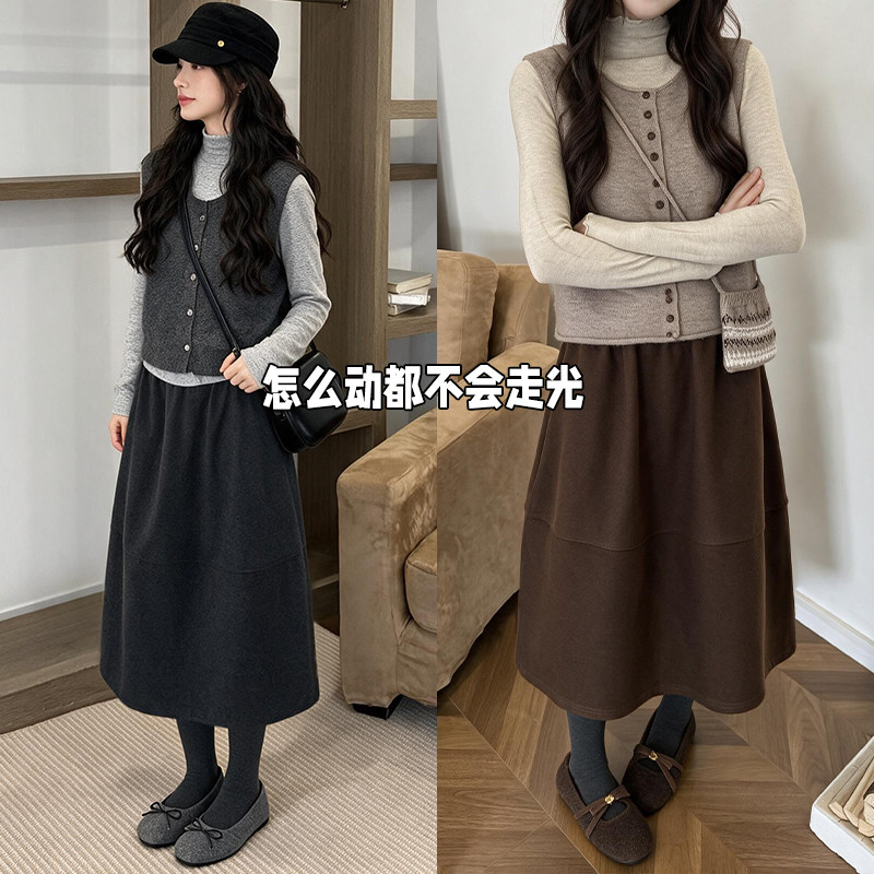 毛呢黑色半身裙短裙女秋冬季2026新款a字伞裙时尚气质五分花苞半