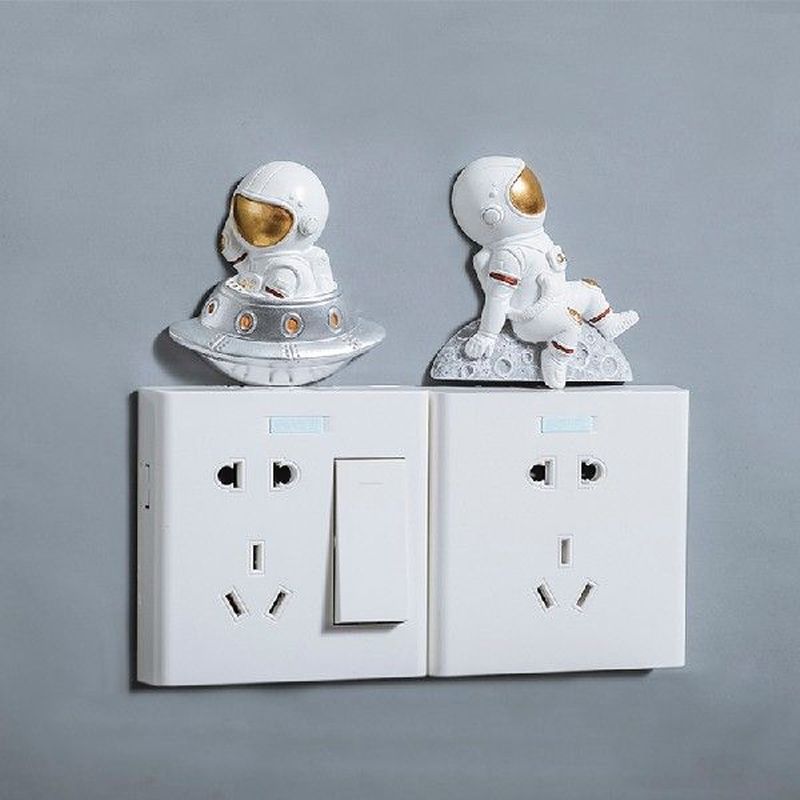 Wall switches are attached to the resin ornaments of the