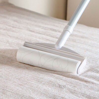 Home long pole is tearing type roller sticky wool implement