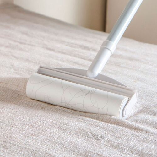 Home long pole is tearing type roller sticky wool implement