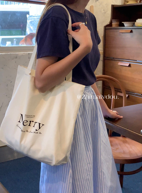 韩系新款黑白极简字母单肩包大容量通勤托特包慵懒风学生帆布袋女