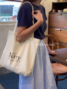 韩系新款黑白极简字母单肩包大容量通勤托特包慵懒风学生帆布袋女