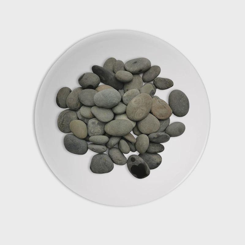 灰色鹅卵石厂家供应抛光铺路灰色石子庭院枯山热敷豆石振洗卵