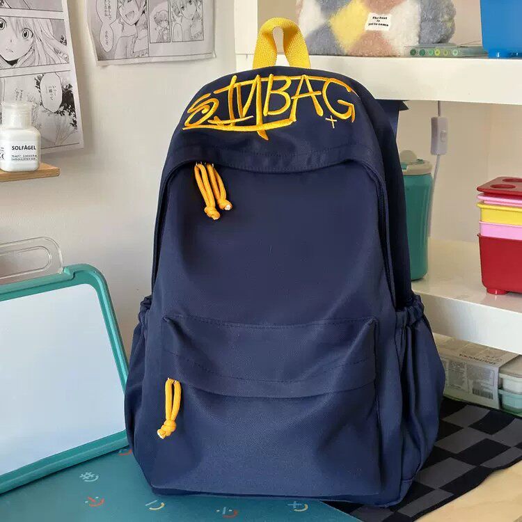 高颜值书包男女初中生高中生大容量百搭减负小学生双肩包电脑背包