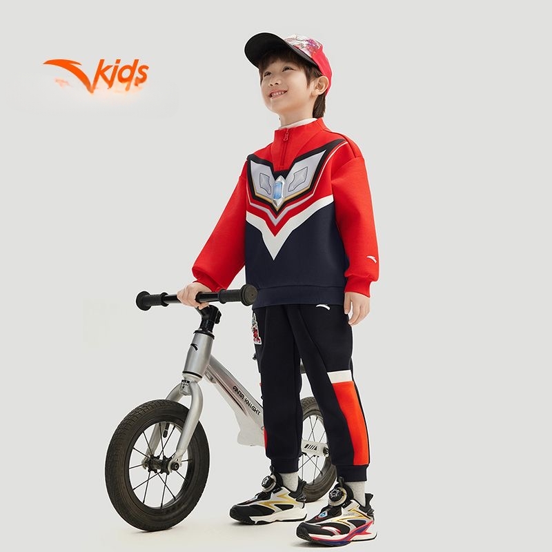 安踏儿童男小童针织套头衫2025春新款舒适亲肤儿童运动卫衣奥特曼