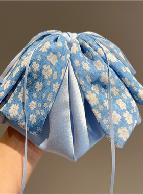 蓝色网纱碎花缎面蝴蝶结马尾抓夹