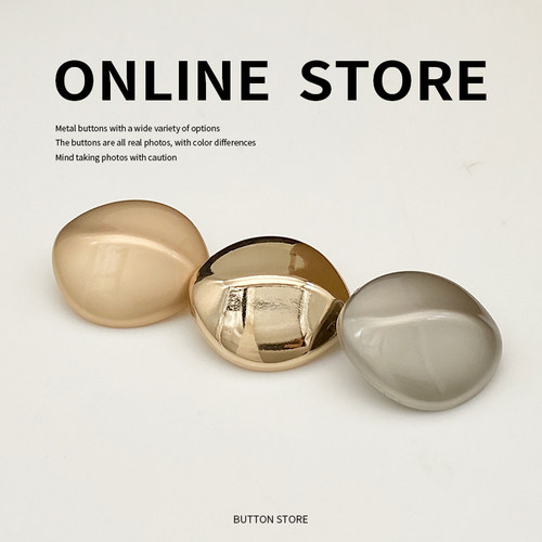 高档金色不规则毛衣开衫裙子扣子