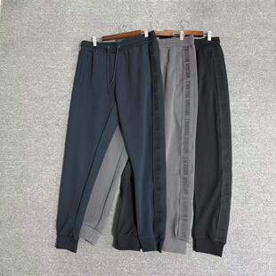 飞姐外贸小铺69棉罗马布双面织男休闲卫裤两侧字母织带拼接收口潮