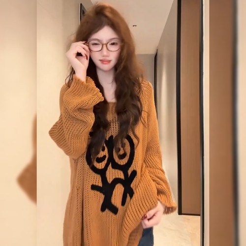 高级感慵懒风提花橘色毛衣