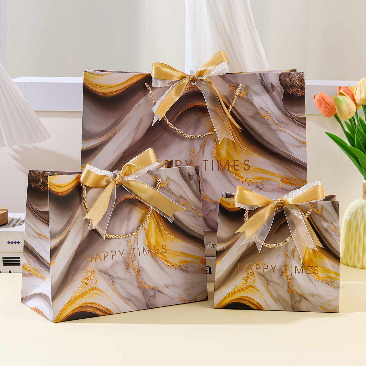 沁莎白卡纸流金礼品袋亏本冲量