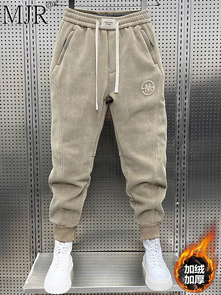 灯芯绒裤子男士冬季潮牌时尚条绒运动卫裤男款加绒加厚宽松束脚裤