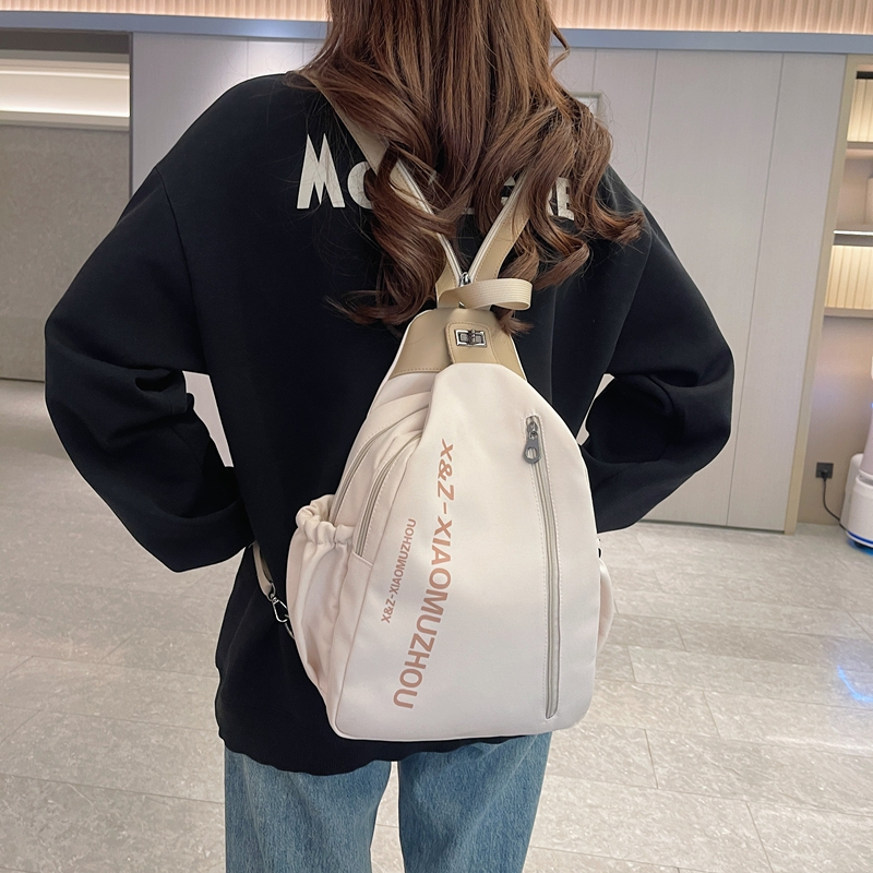 大容量双肩包男百搭多功能手提斜跨背包时尚通勤单肩包女休闲轻便