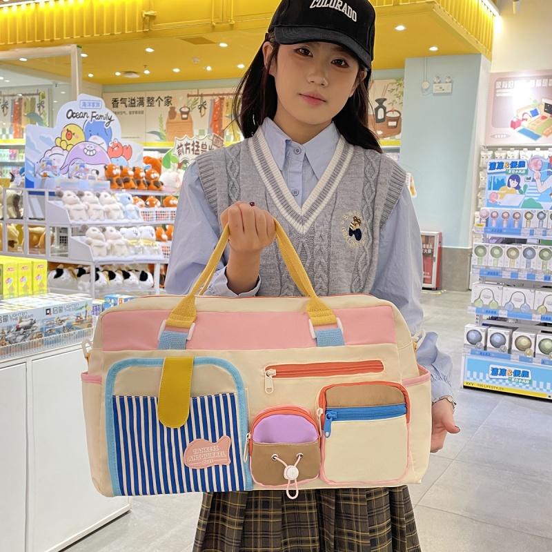 撞色旅行包开学季学生返校斜挎包