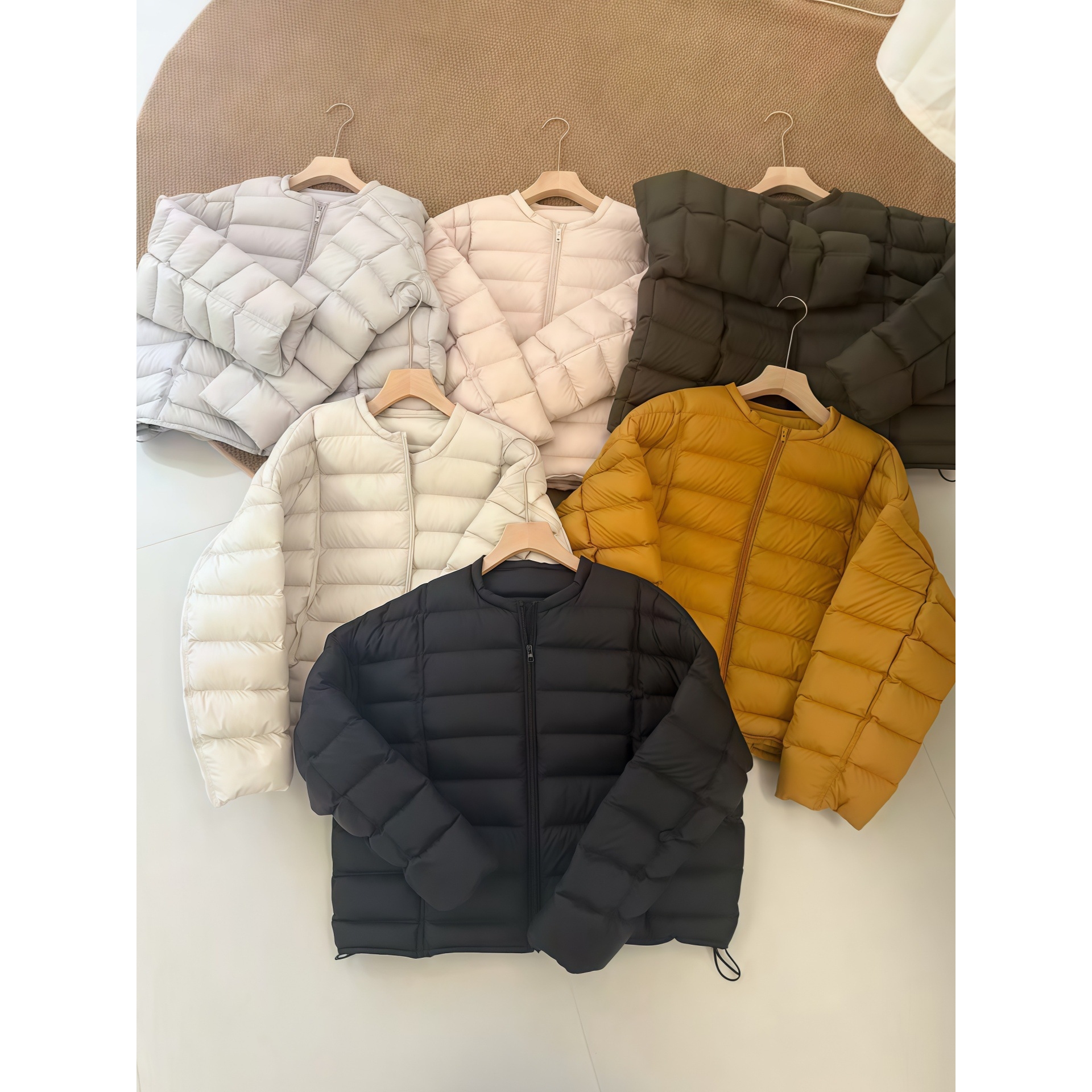 简若羽绒服云感排骨无领2025冬季新款小个子时尚宽松百搭短款女士