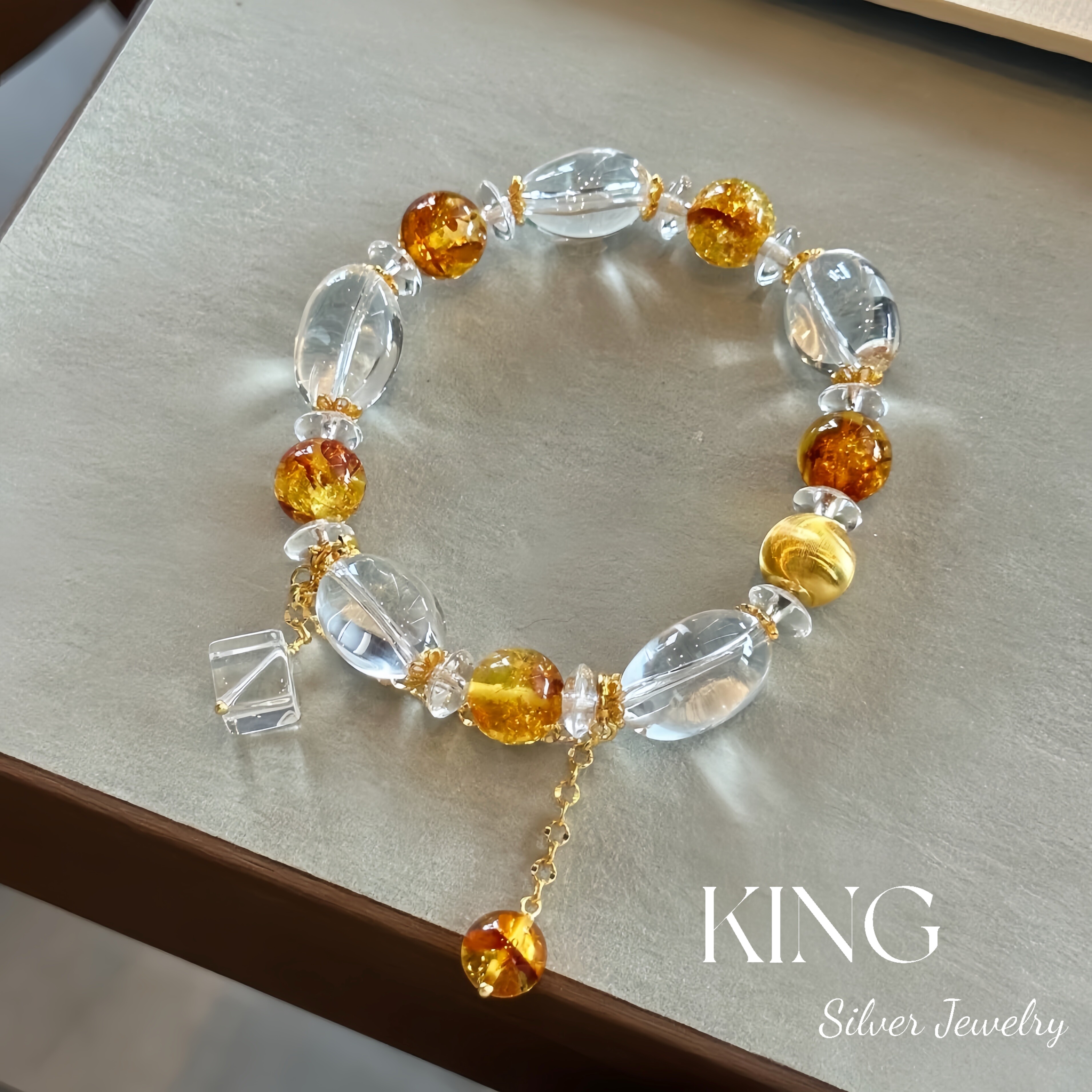 king银饰珠宝重工花珀白水晶手串
